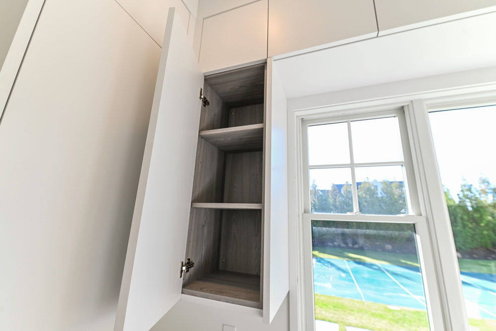 Large White Modern Kitchen with Island and Quartz Countertops