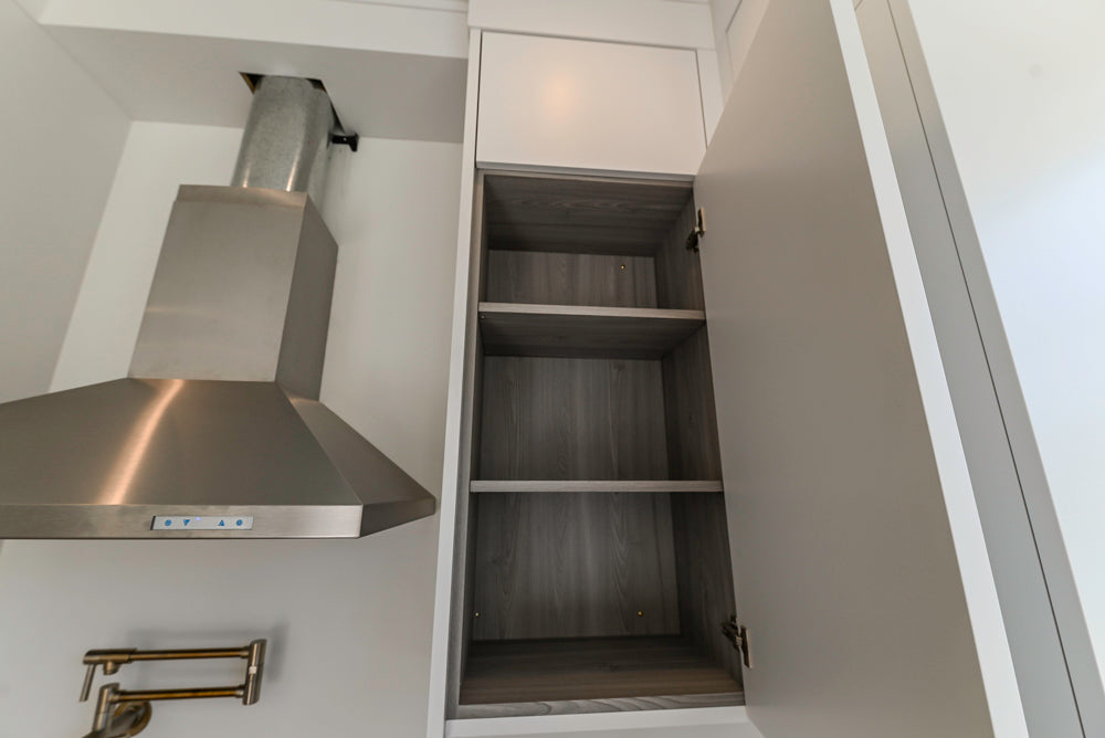 Large White Modern Kitchen with Island and Quartz Countertops