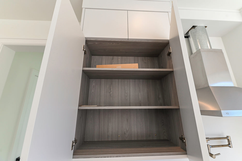 Large White Modern Kitchen with Island and Quartz Countertops