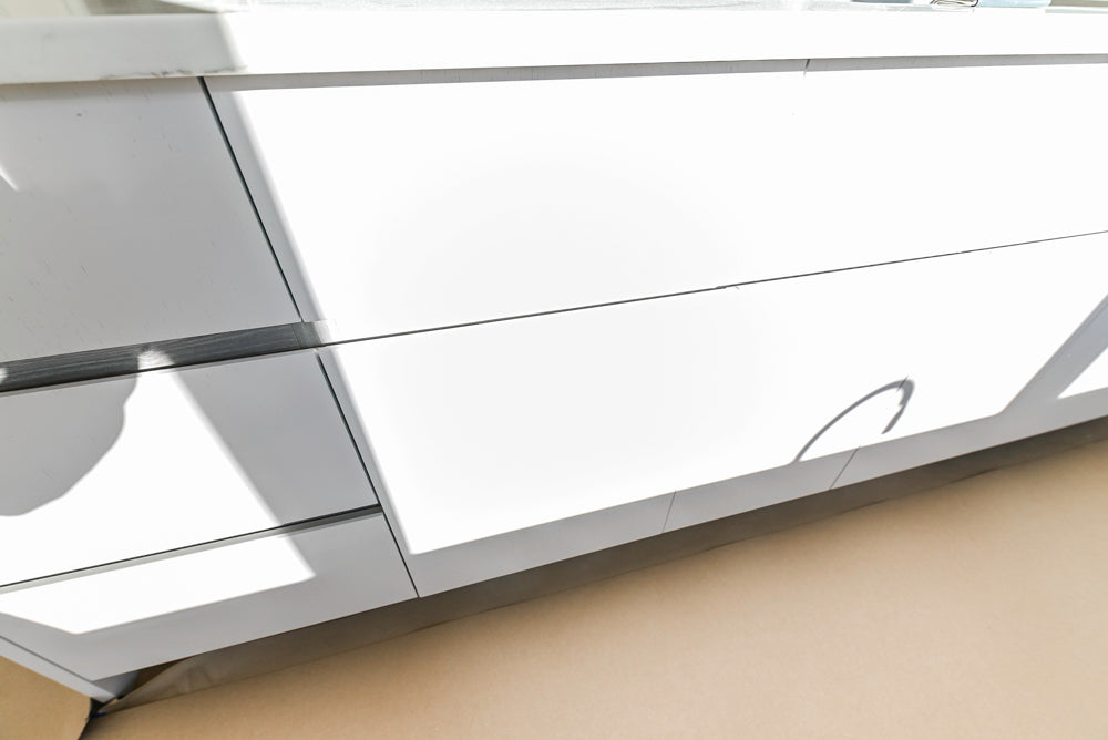 Large White Modern Kitchen with Island and Quartz Countertops