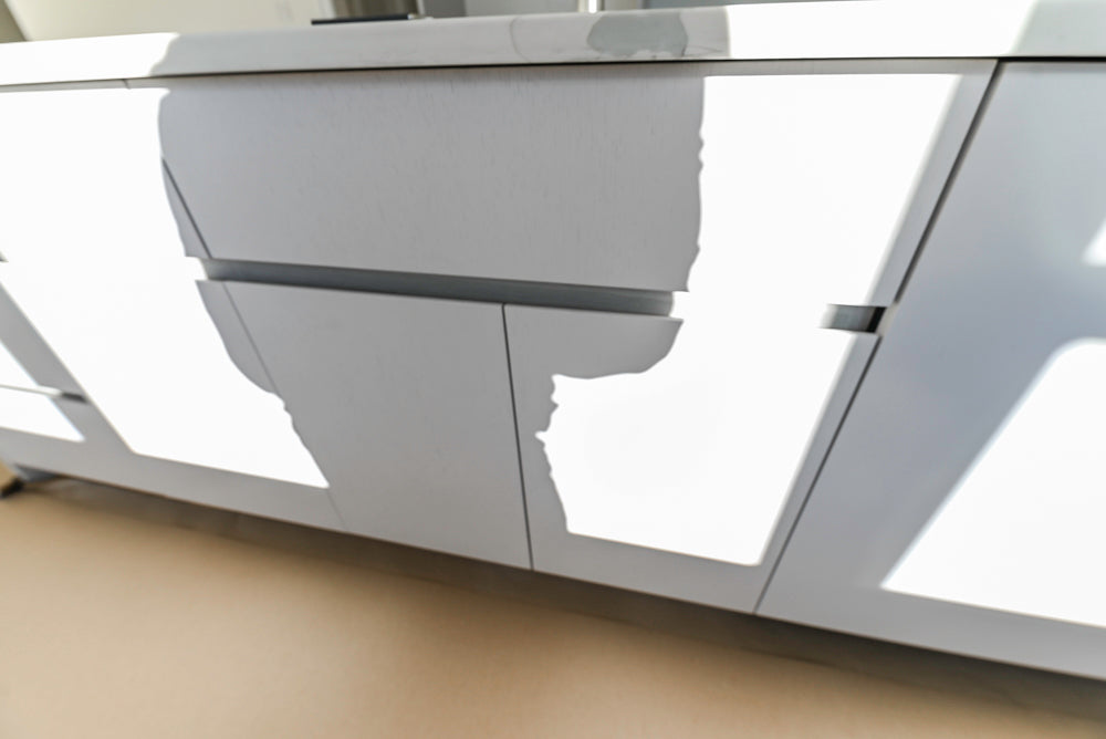 Large White Modern Kitchen with Island and Quartz Countertops