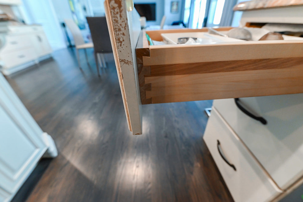 Schrock Traditional Cream Kitchen with Island and Granite Countertops