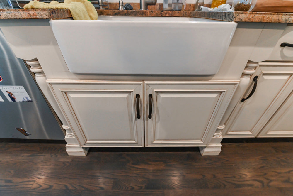 Schrock Traditional Cream Kitchen with Island and Granite Countertops