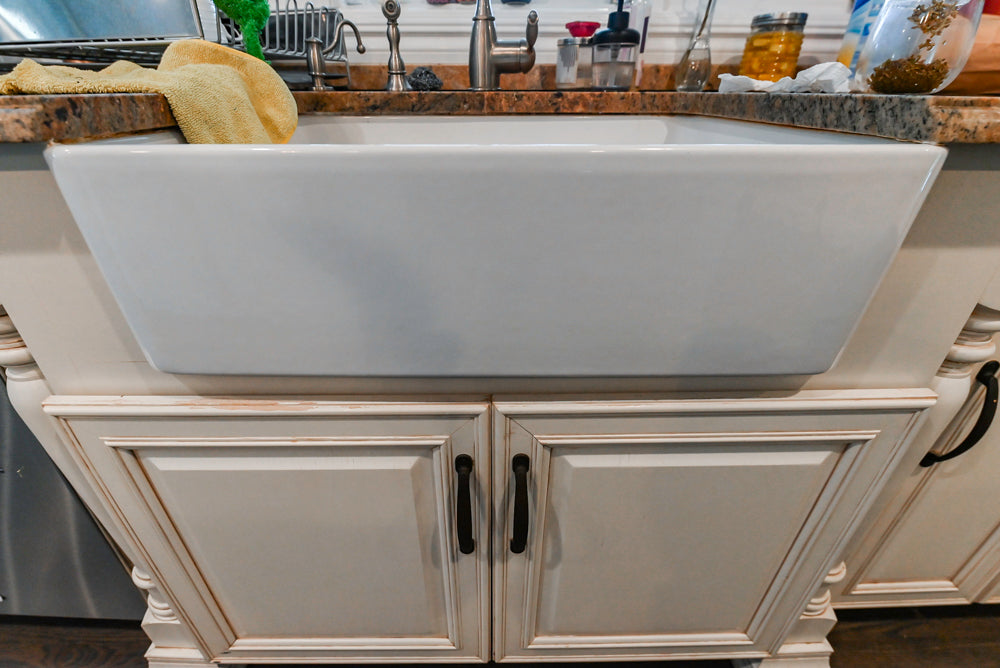 Schrock Traditional Cream Kitchen with Island and Granite Countertops
