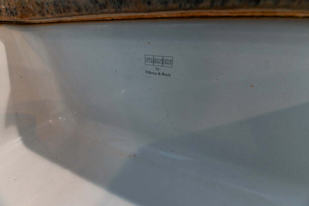 Schrock Traditional Cream Kitchen with Island and Granite Countertops