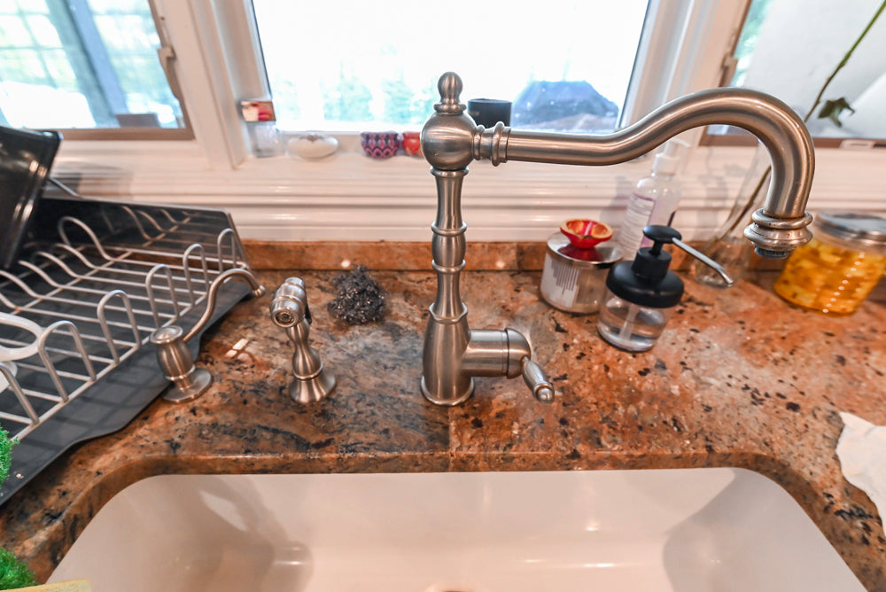 Schrock Traditional Cream Kitchen with Island and Granite Countertops