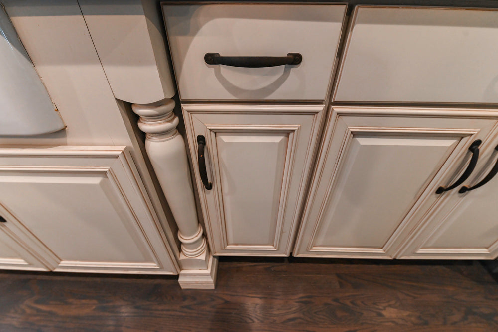 Schrock Traditional Cream Kitchen with Island and Granite Countertops