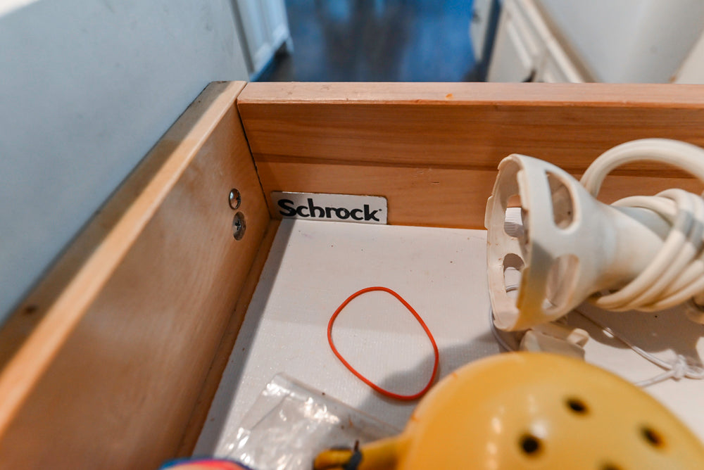 Schrock Traditional Cream Kitchen with Island and Granite Countertops