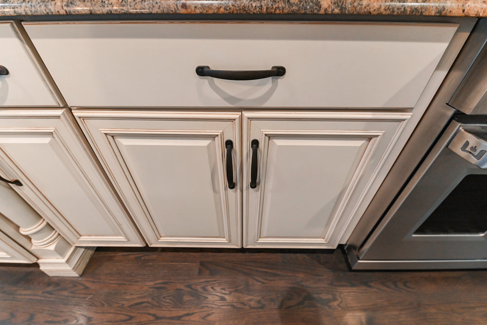 Schrock Traditional Cream Kitchen with Island and Granite Countertops