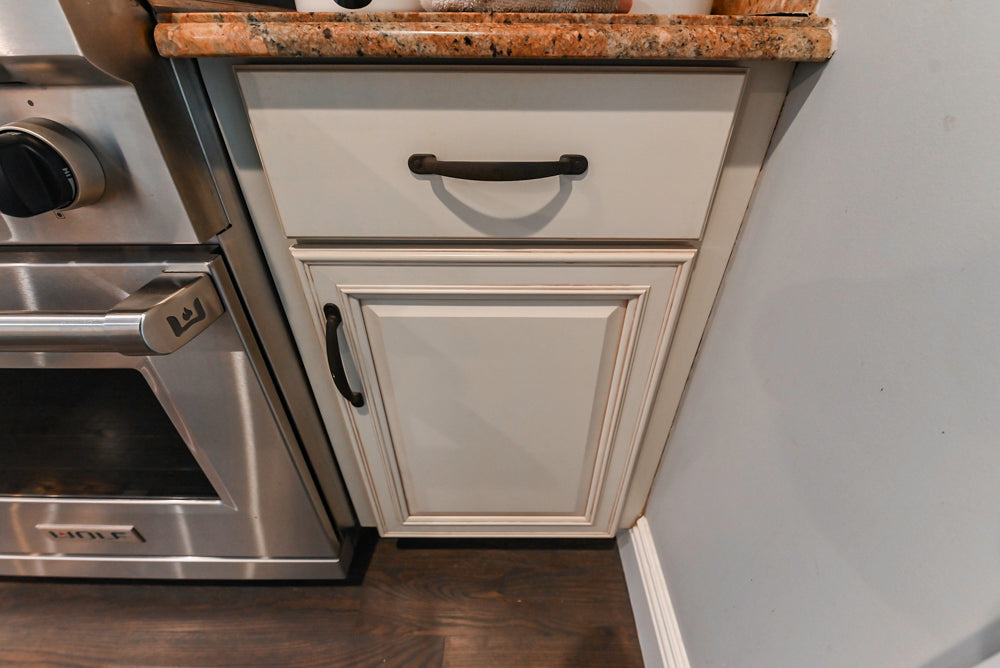 Schrock Traditional Cream Kitchen with Island and Granite Countertops
