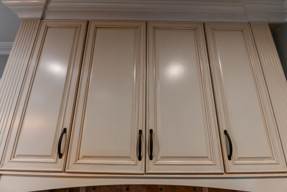 Schrock Traditional Cream Kitchen with Island and Granite Countertops