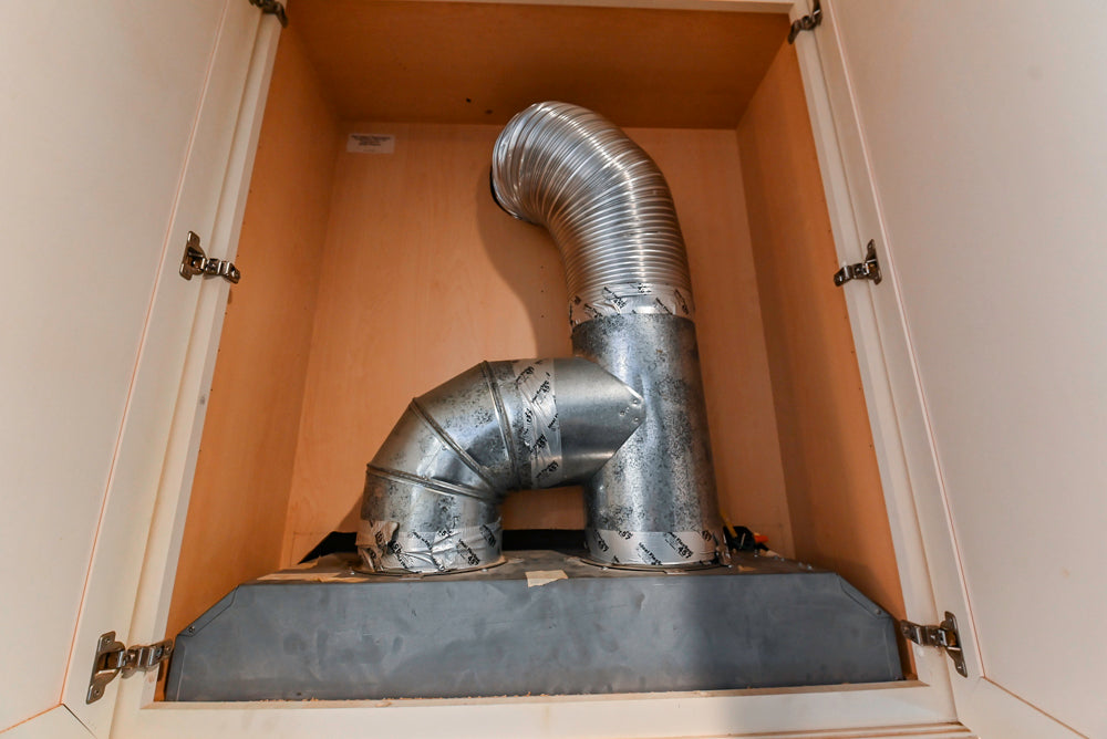 Schrock Traditional Cream Kitchen with Island and Granite Countertops