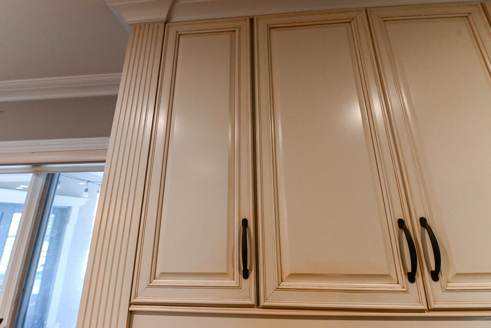 Schrock Traditional Cream Kitchen with Island and Granite Countertops