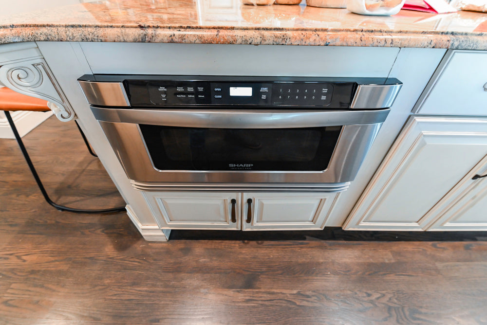 Schrock Traditional Cream Kitchen with Island and Granite Countertops