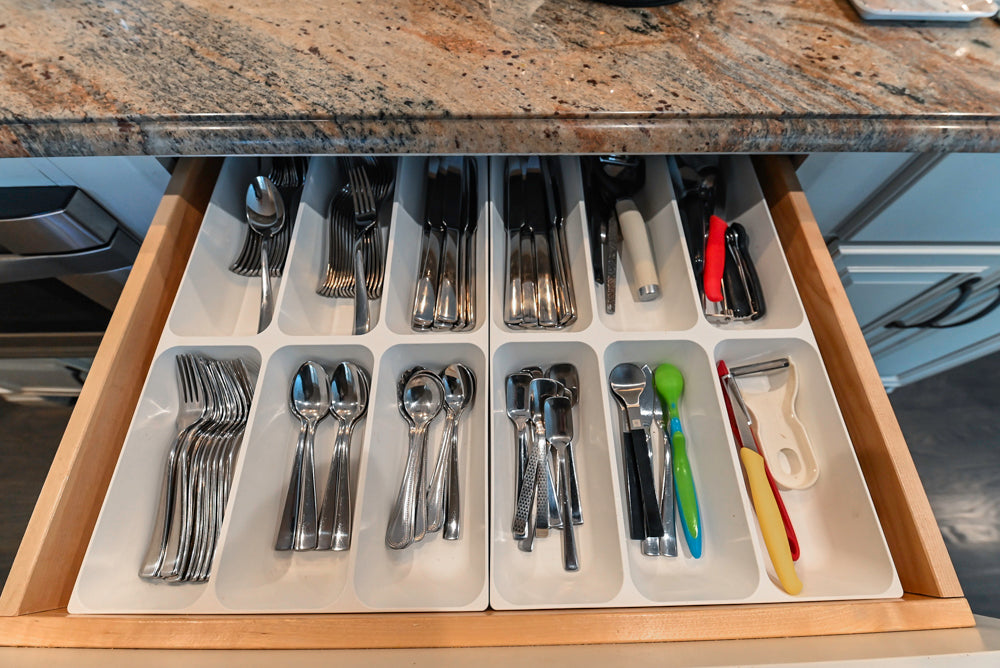 Schrock Traditional Cream Kitchen with Island and Granite Countertops