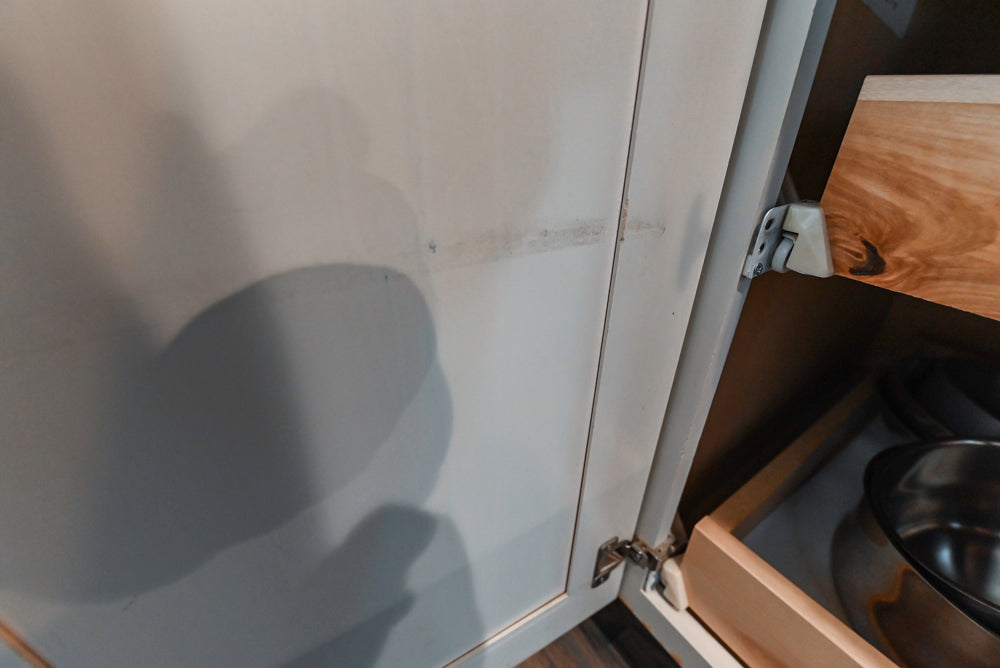 Schrock Traditional Cream Kitchen with Island and Granite Countertops