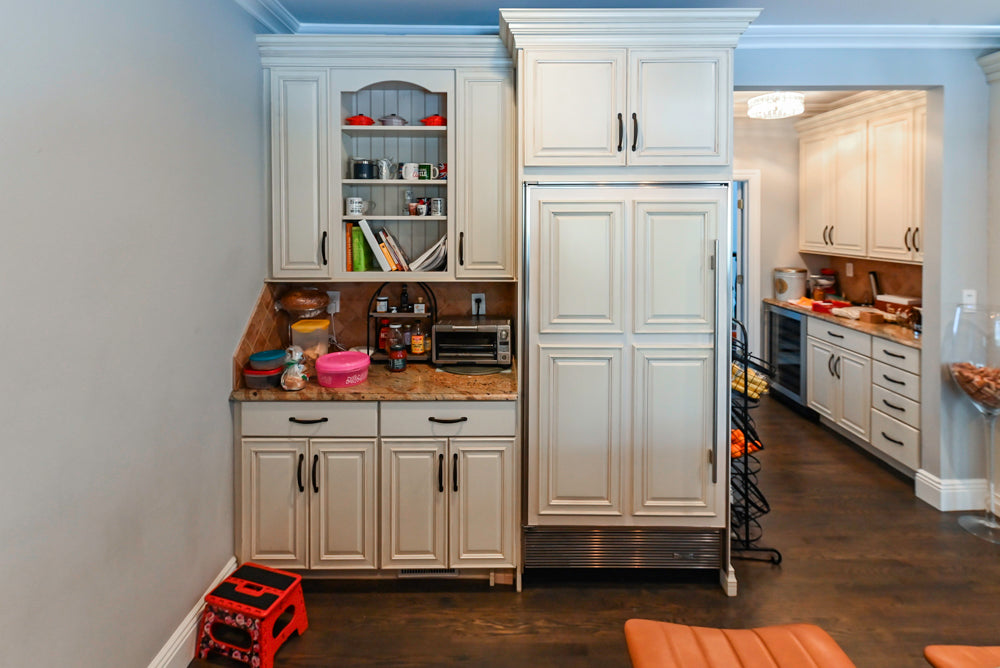 Schrock Traditional Cream Kitchen with Island and Granite Countertops