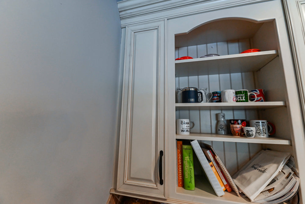 Schrock Traditional Cream Kitchen with Island and Granite Countertops