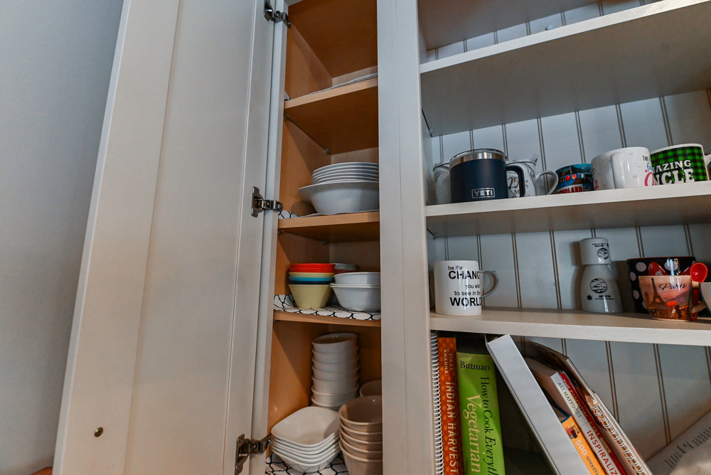 Schrock Traditional Cream Kitchen with Island and Granite Countertops