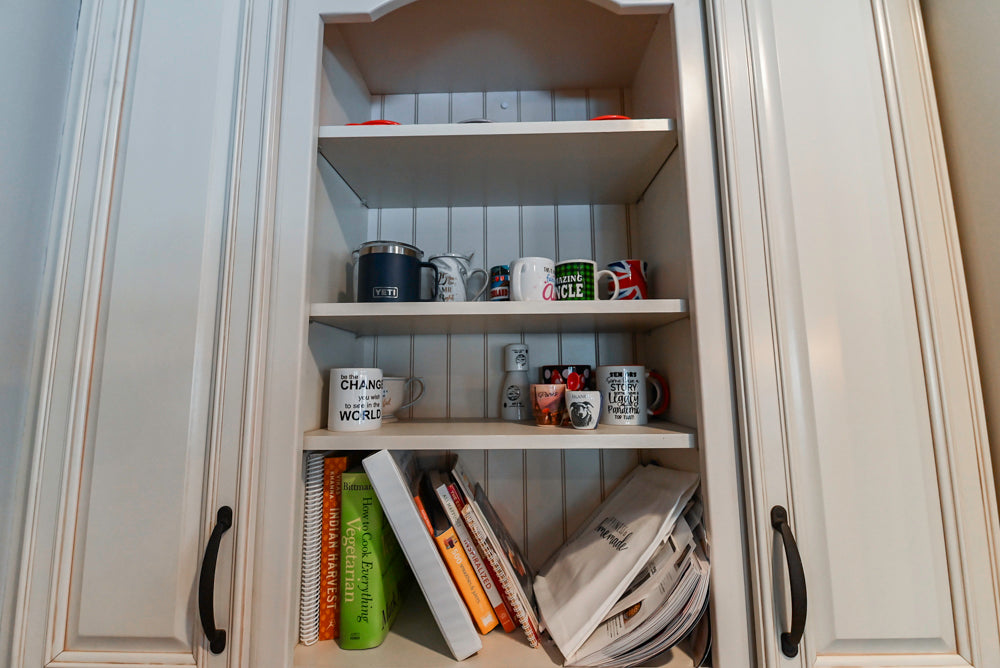 Schrock Traditional Cream Kitchen with Island and Granite Countertops