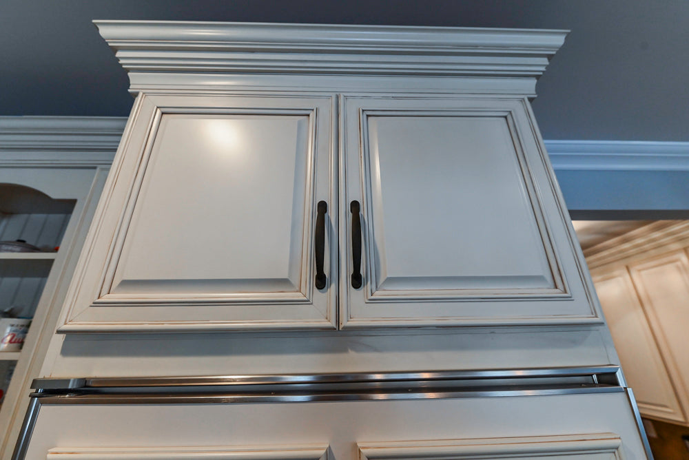 Schrock Traditional Cream Kitchen with Island and Granite Countertops