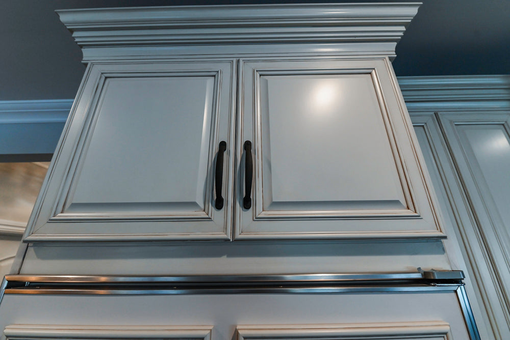 Schrock Traditional Cream Kitchen with Island and Granite Countertops