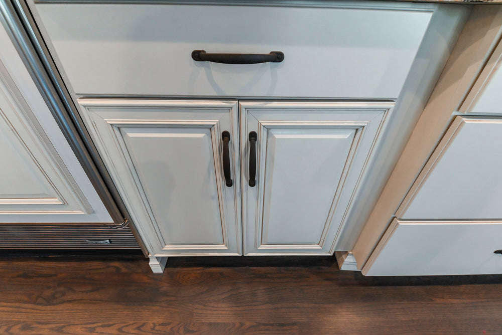 Schrock Traditional Cream Kitchen with Island and Granite Countertops