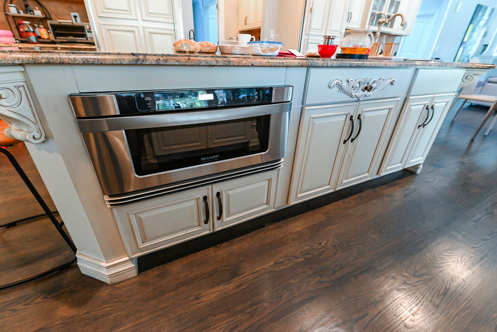 Schrock Traditional Cream Kitchen with Island and Granite Countertops