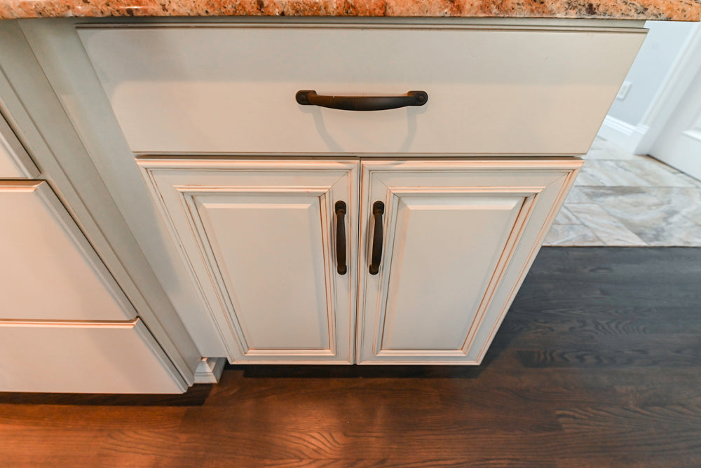 Schrock Traditional Cream Kitchen with Island and Granite Countertops