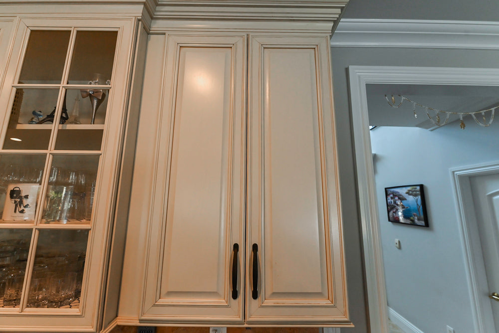 Schrock Traditional Cream Kitchen with Island and Granite Countertops
