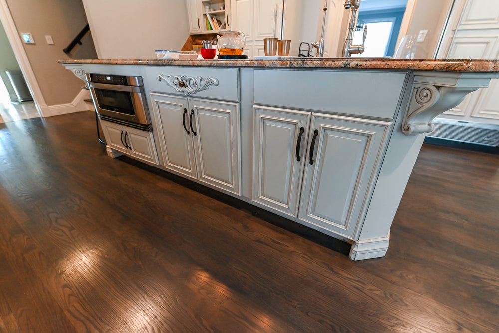 Schrock Traditional Cream Kitchen with Island and Granite Countertops