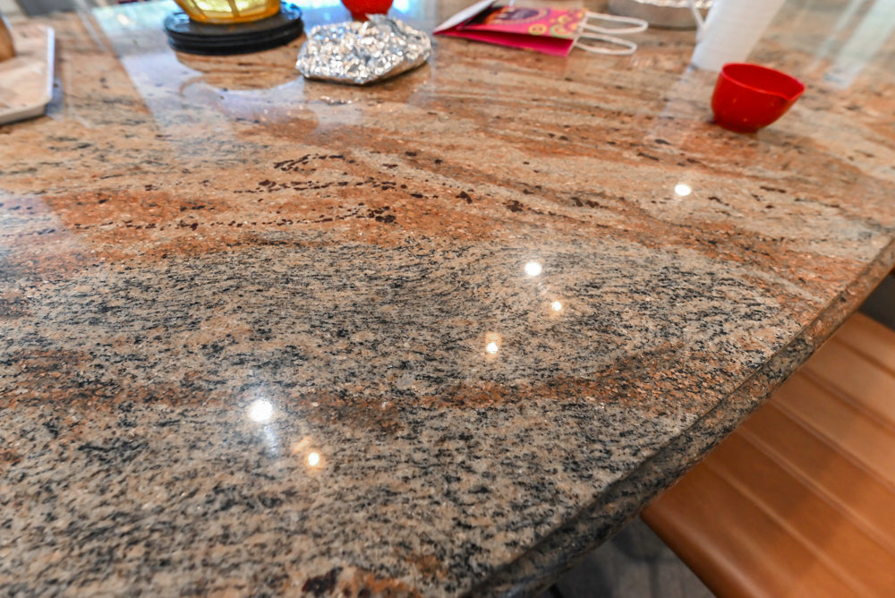 Schrock Traditional Cream Kitchen with Island and Granite Countertops