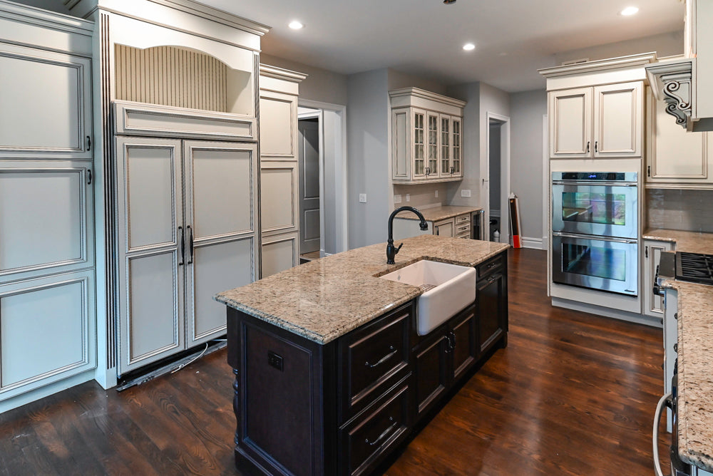 Kitchen Craft Traditional White Kitchen with Island, Granite Countertops and Appliances