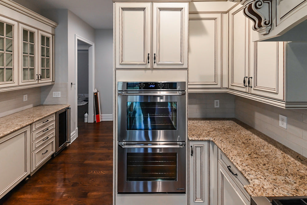 Kitchen Craft Traditional White Kitchen with Island, Granite Countertops & Appliances