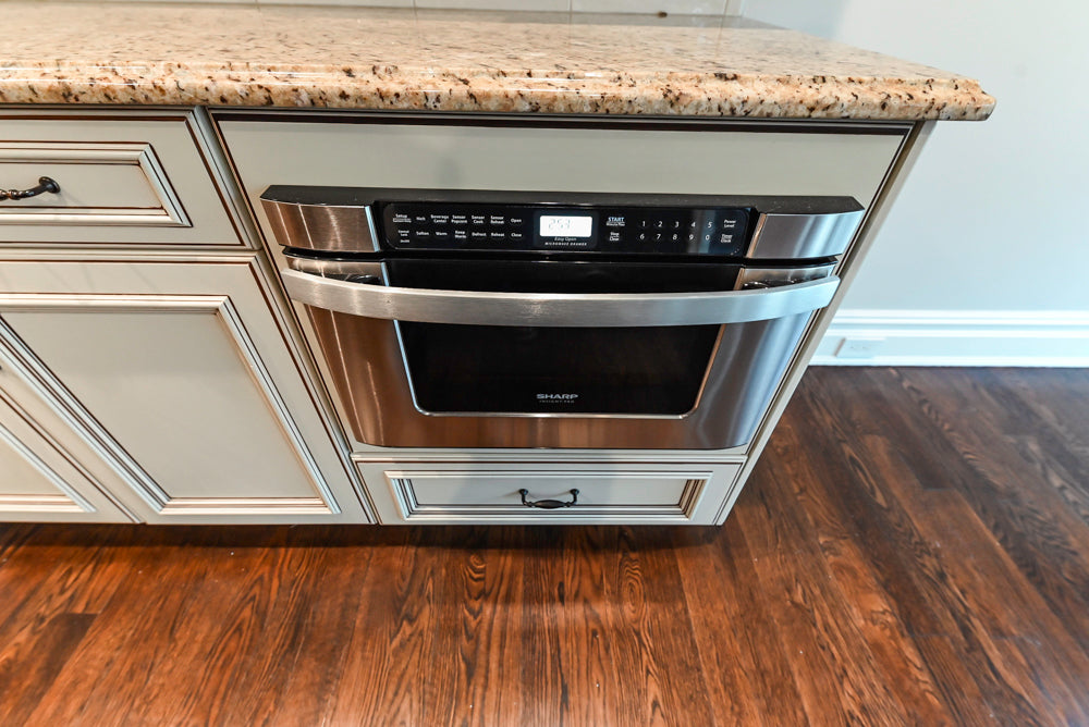 Kitchen Craft Traditional White Kitchen with Island, Granite Countertops & Appliances