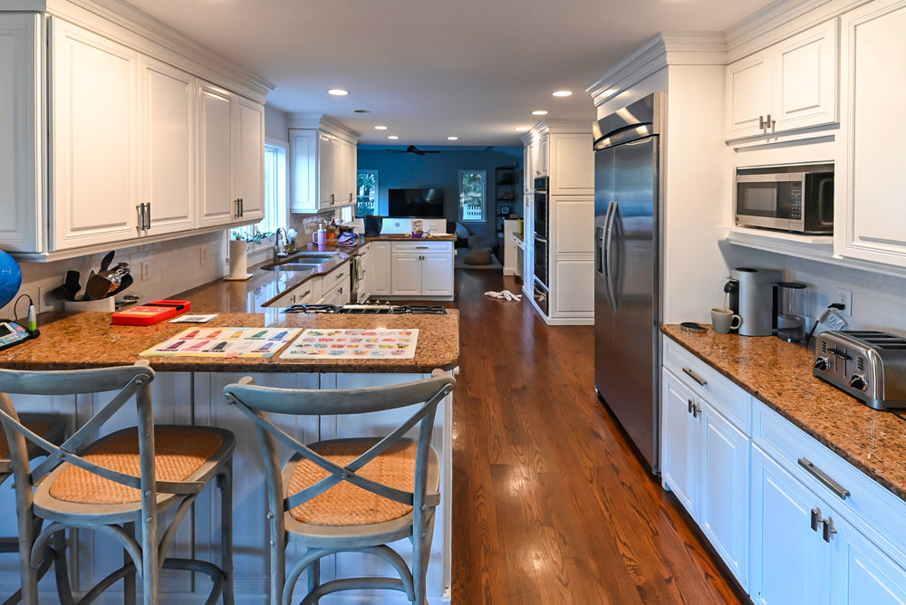 Traditional White Kitchen with Desk Area, Granite Countertops & Thermador Appliances