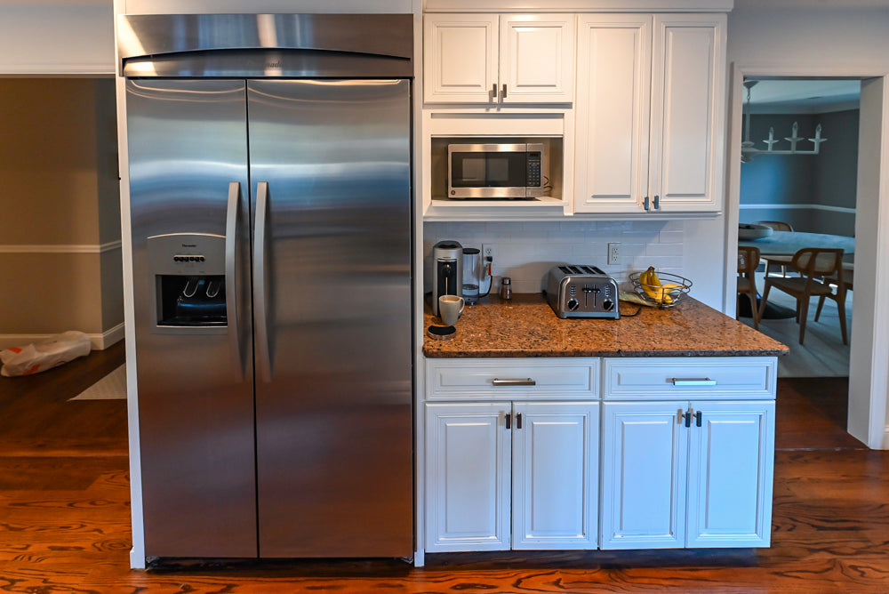 Traditional White Kitchen with Desk Area, Granite Countertops & Thermador Appliances