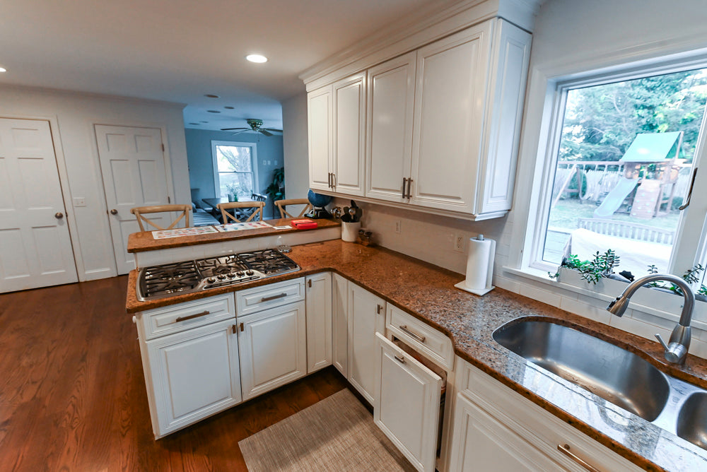 Traditional White Kitchen with Desk Area, Granite Countertops & Thermador Appliances