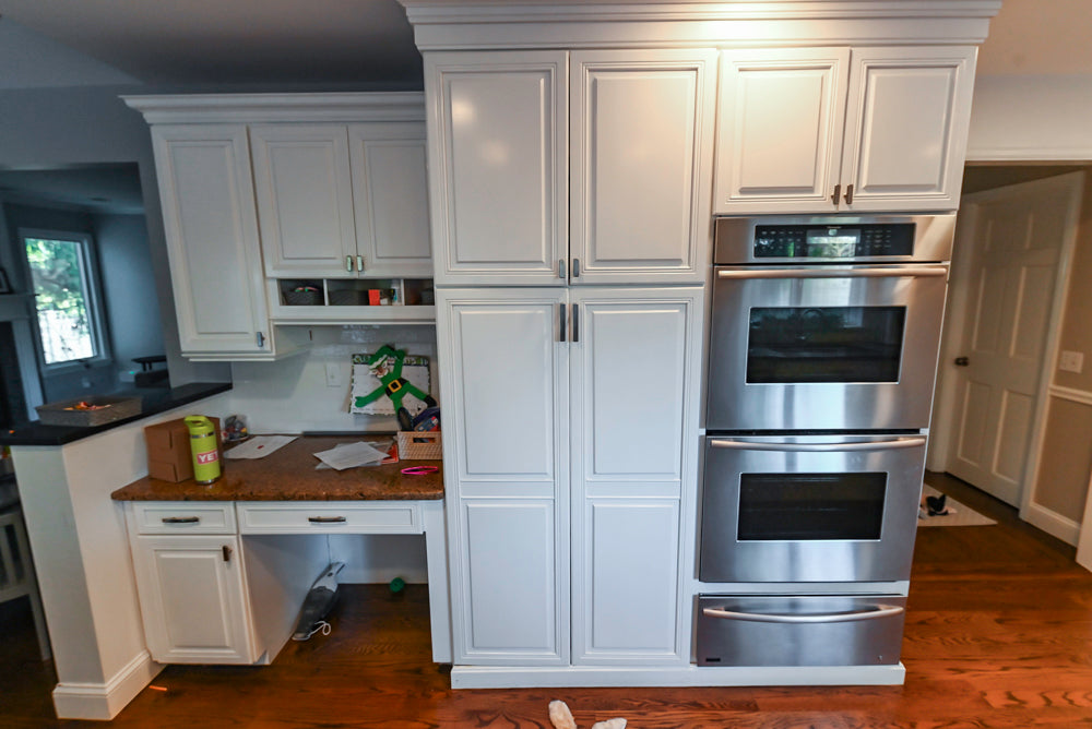 Traditional White Kitchen with Desk Area, Granite Countertops & Thermador Appliances