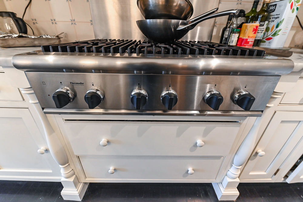 Heritage Traditional Creamy White Kitchen with Island, Marble Countertops and Appliances
