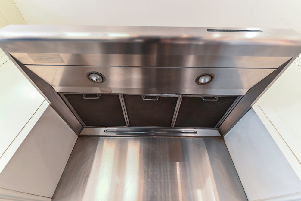 Heritage Traditional Creamy White Kitchen with Island, Marble Countertops and Appliances