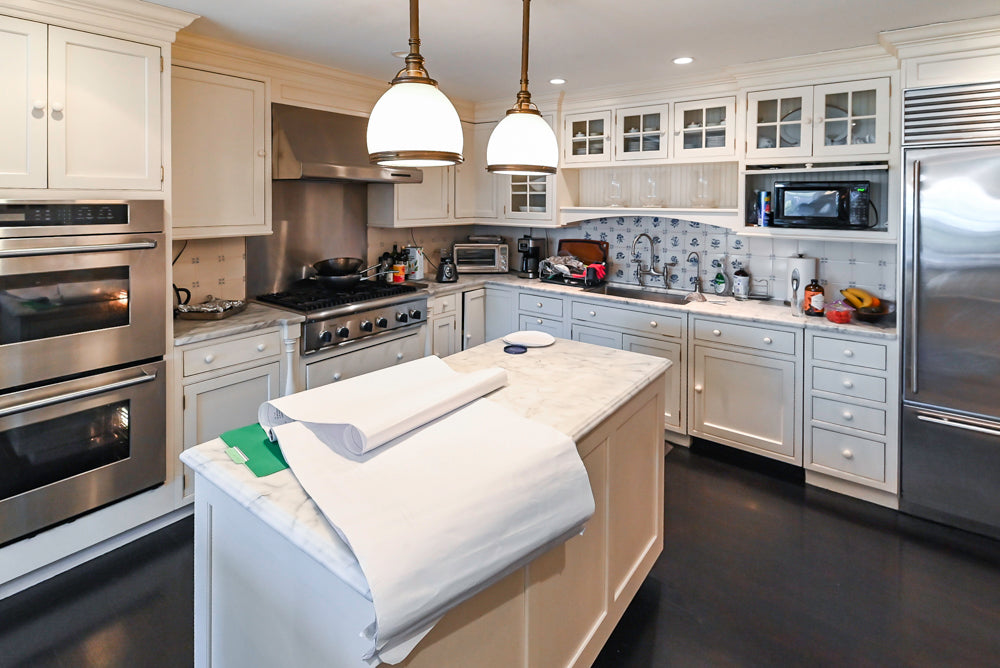 Heritage Traditional Creamy White Kitchen with Island, Marble Countertops and Appliances