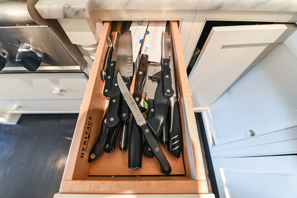 Heritage Traditional Creamy White Kitchen with Island, Marble Countertops and Appliances