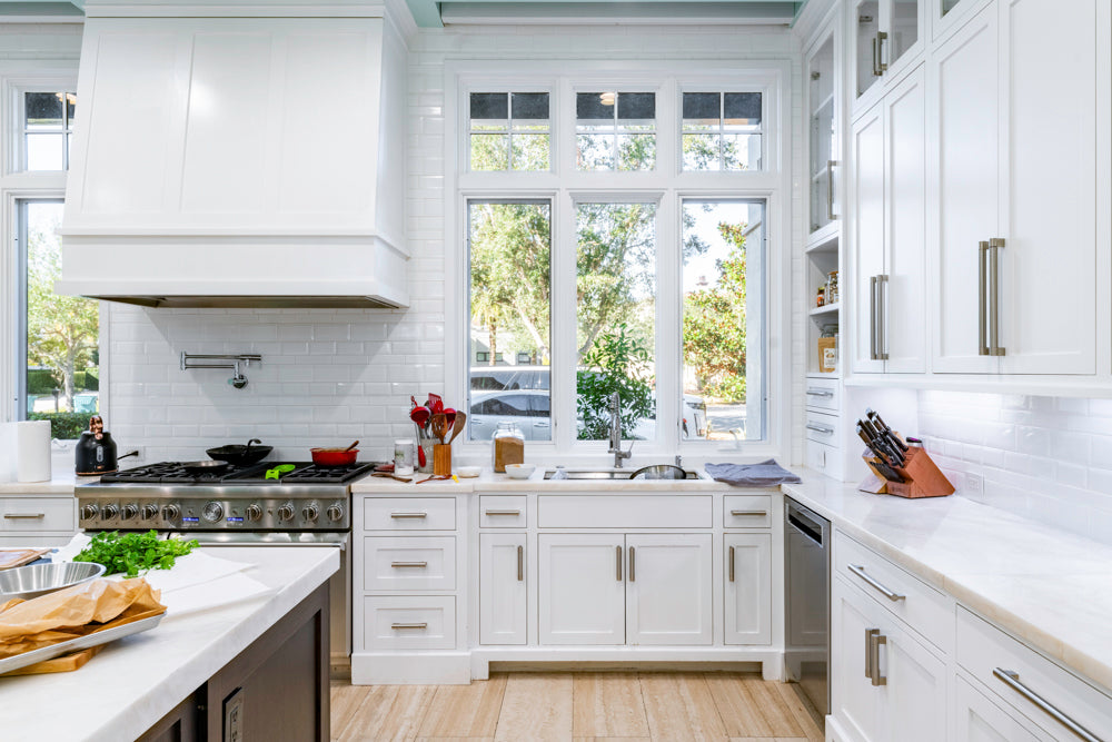 Large Transitional White Kitchen with Marble Countertops and Grand Island with Seating