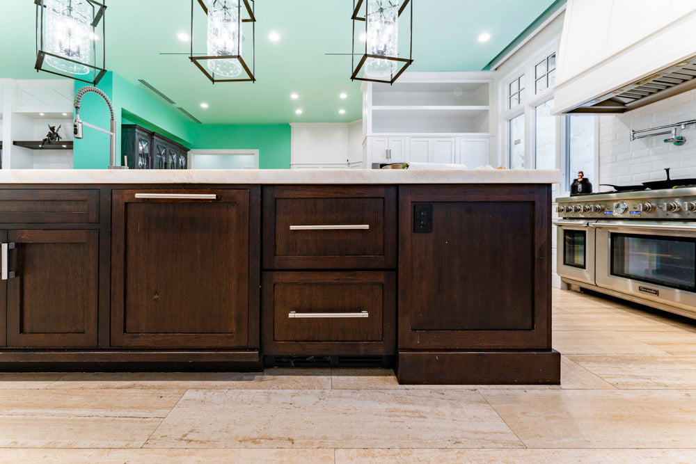 Transitional White Kitchen with Marble Countertops and Grand Island with Seating