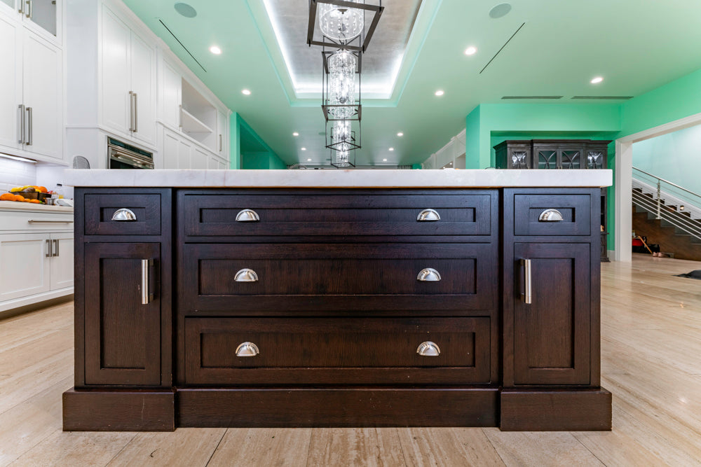Transitional White Kitchen with Marble Countertops and Grand Island with Seating