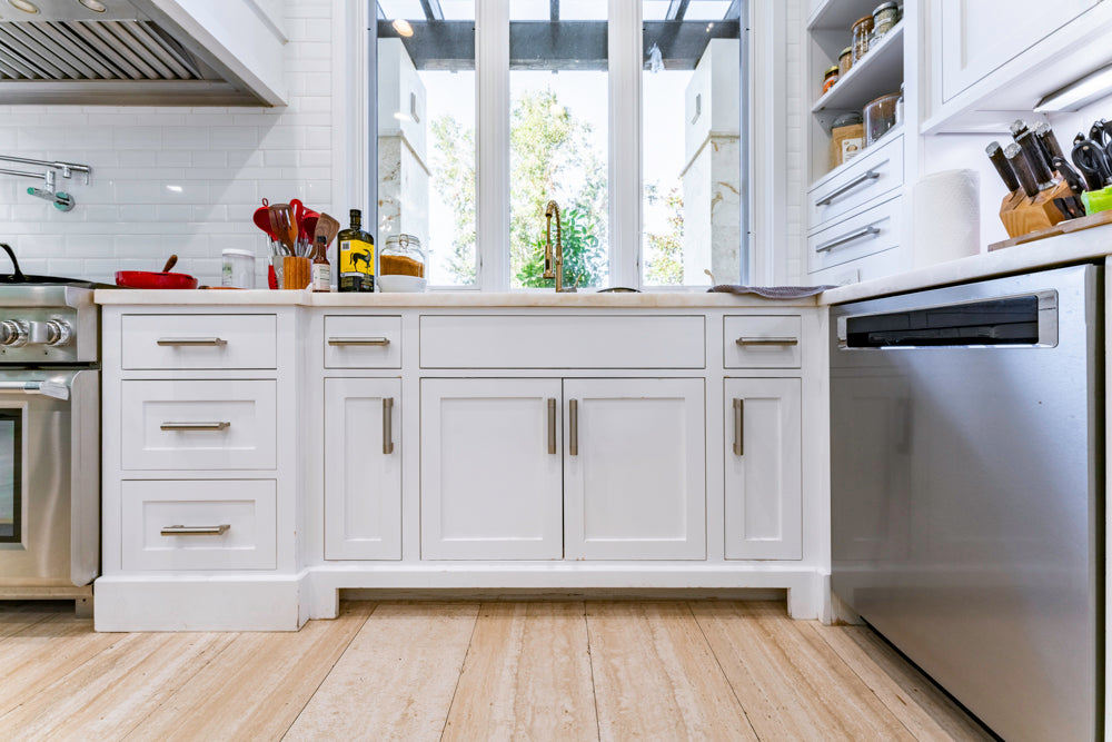 Transitional White Kitchen with Marble Countertops and Grand Island with Seating