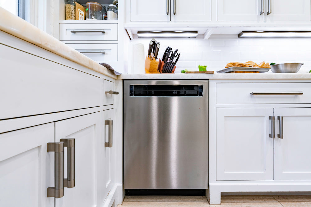 Transitional White Kitchen with Marble Countertops and Grand Island with Seating