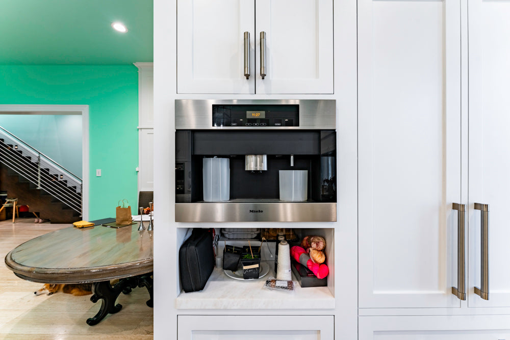 Transitional White Kitchen with Marble Countertops and Grand Island with Seating