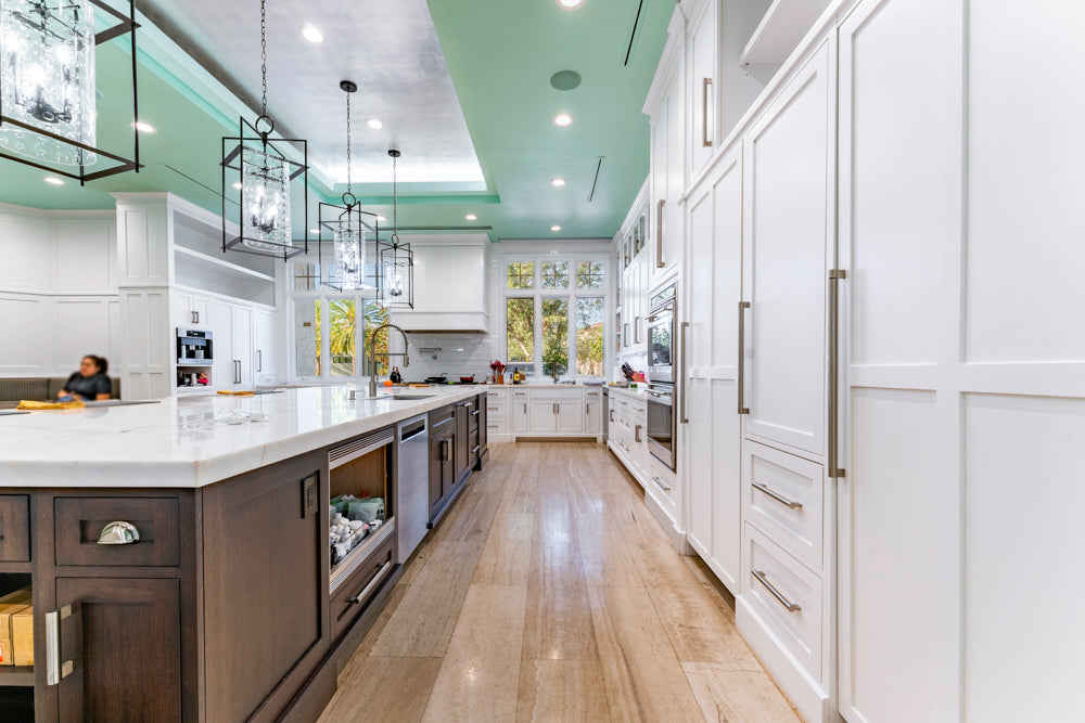 Large Transitional White Kitchen with Marble Countertops and Grand Island with Seating